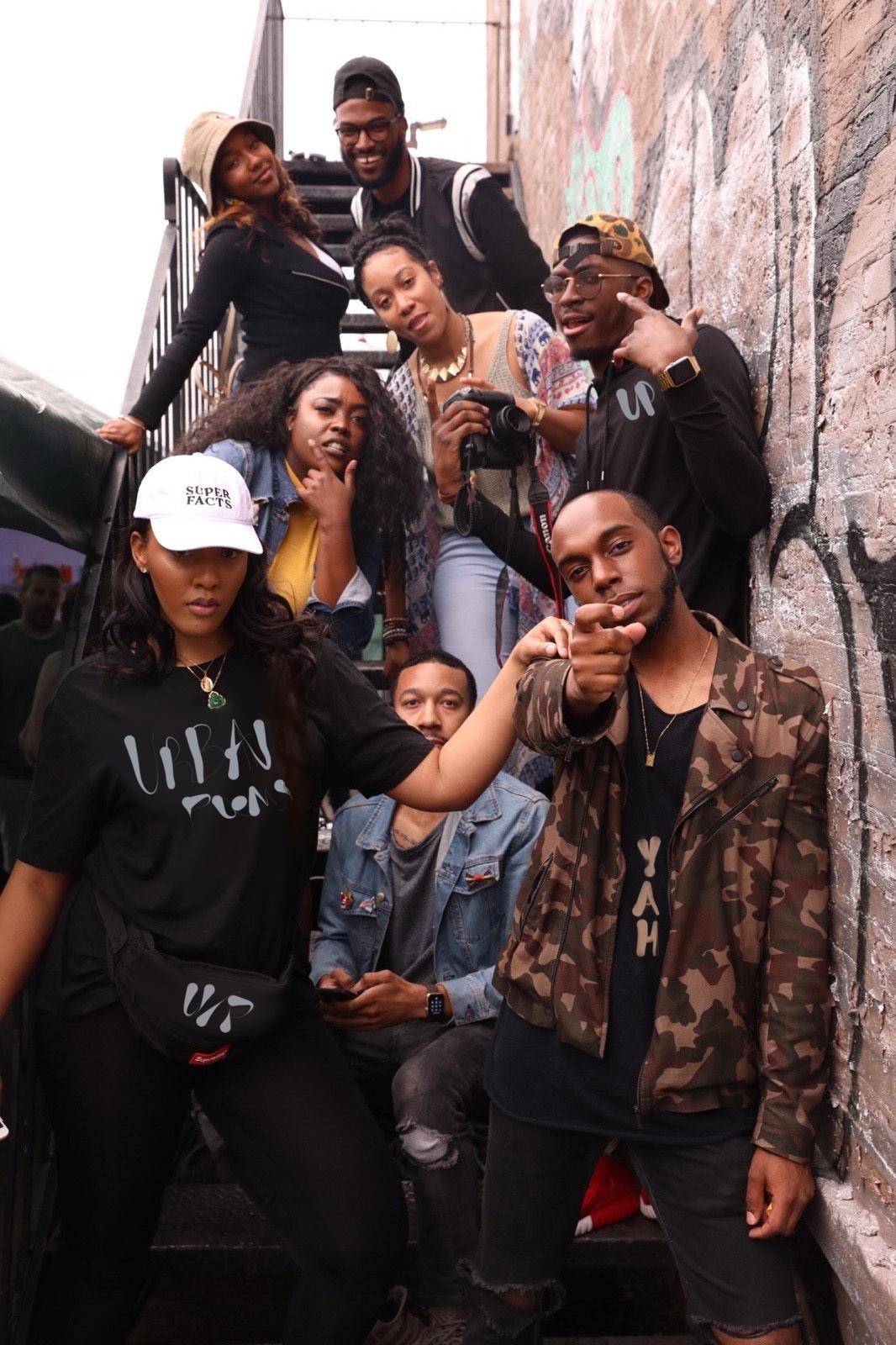 A group of African American poets reciting poetry